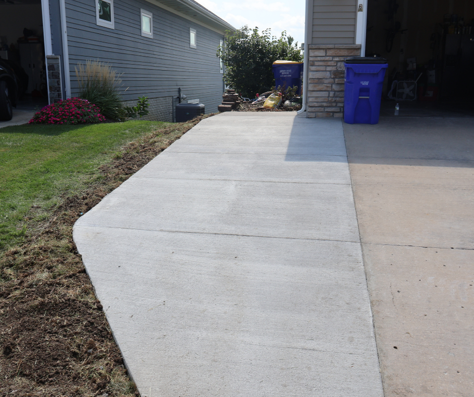 After concrete driveway and pad installation in North Liberty, Iowa